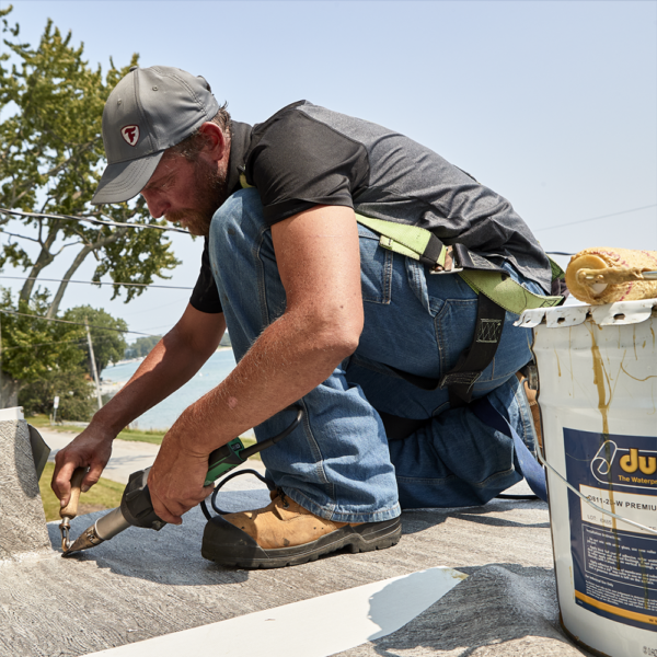 Authorized Duradek Installer Working With Duradek As A Commercial Roofing Material